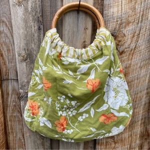Green and orange floral canvas purse with circular bamboo handle, reversible!